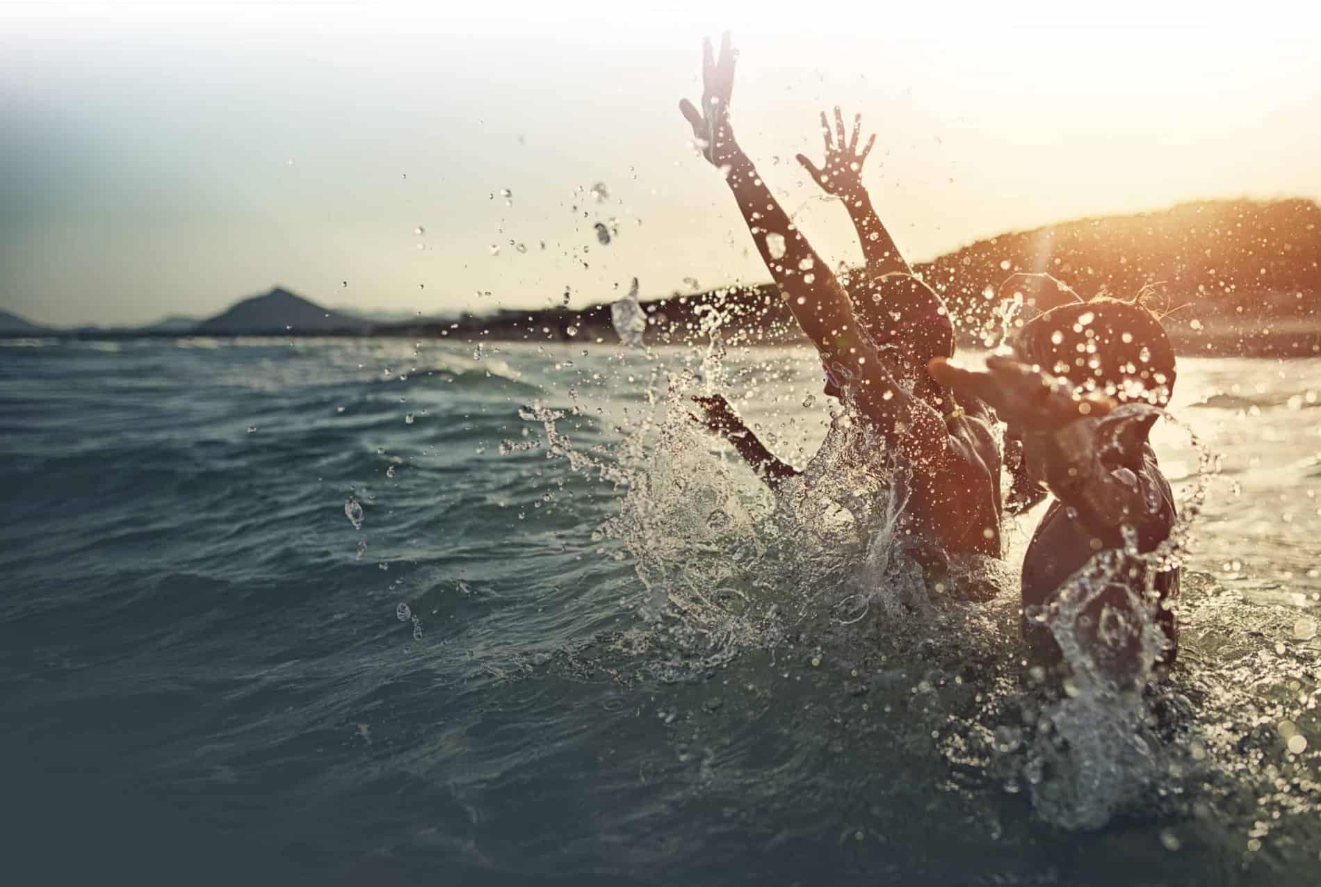 people splashing in water